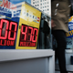 A Brooklyn convenience store advertises the Mega Millions lottery on October 19, 2018 in the Brooklyn borough of New York City.